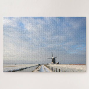 Winterlandschaft mit Schnee und Windmühle in Holla Puzzle