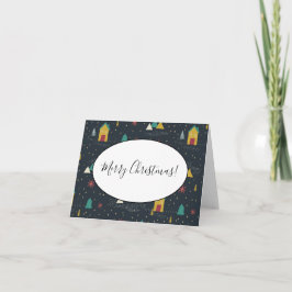 Winternachtsschneeflocken landen auf kleinen Häuse