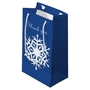 Winterschneeflocken in der Blue-Geschenktasche Kleine Geschenktüte