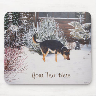 Winterschneewelt mit niedlichem Schwarz und Bräunl Mousepad