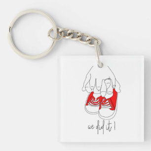 Winzige Hände und winzige Füße bereit zum Pop Schlüsselanhänger