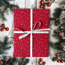 Winzige weiße Sterne an roten Weihnachten