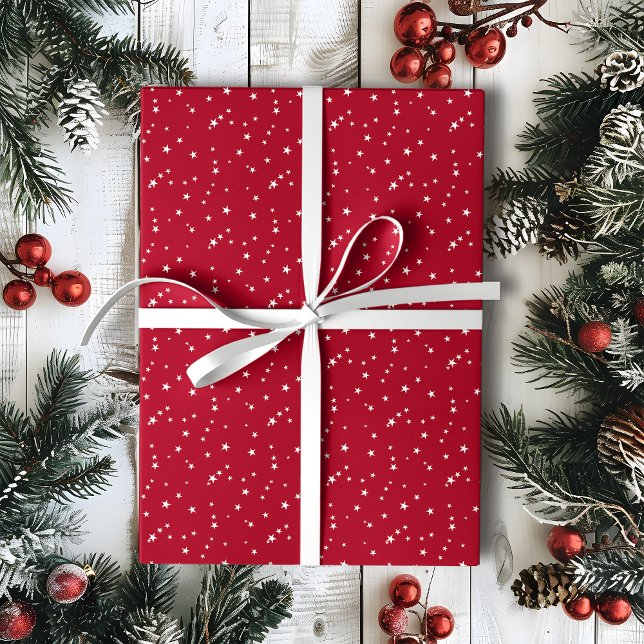 Winzige weiße Sterne an roten Weihnachten Geschenkpapier (Von Creator hochgeladen)