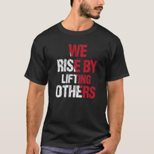 Wir erheben uns, indem wir andere erheben Inspira T-Shirt