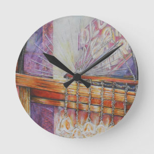 Wir fliegen alle Motten um das gleiche Licht. Runde Wanduhr