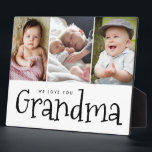 Wir Liebe Sie Oma mehrere Großkinder Fotos Fotoplatte<br><div class="desc">Das "Customizable 'We Liebe You Oma' Foto Easel Plaque" ist ein herzliches und nachdenkliches Geschenk, das die besondere Bindung zwischen einer Oma und ihren Enkelkindern feiert. Diese wunderschön gestaltete Tafel ermöglicht es Ihnen, mehrere hochgeschätzte Fotos der Enkel zu präsentieren, was sie zu einem wahrhaft personalisierten und sentimentalen Sake macht. Die...</div>