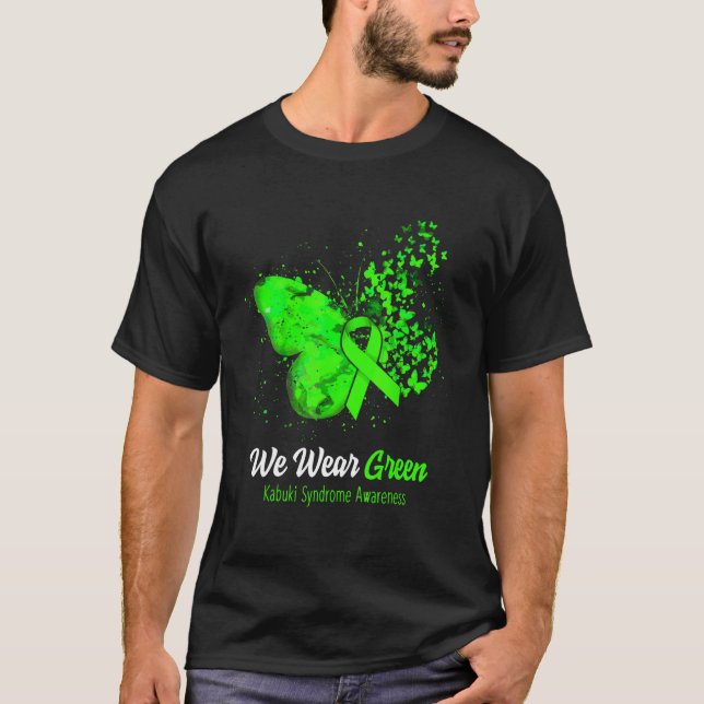Wir tragen einen grünen Kabuki-Syndrom-Butterfly T-Shirt (Vorderseite)