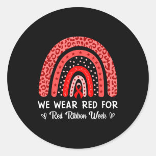 Wir tragen Rot für den Regenbogen der Red Ribbon W Runder Aufkleber