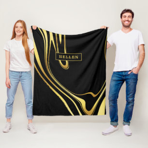 Wirbles Design aus Schwarz und abstraktem Gold Fleecedecke