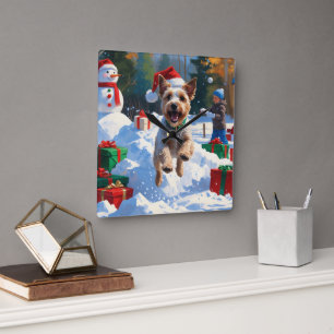 Wire Fox Terrier Running Snow mit Weihnachtshut Quadratische Wanduhr