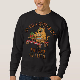 Witz über Meeresfrüchte-Diät – Hungrige Katze mit  Sweatshirt