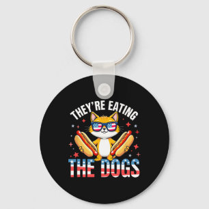 Witzige Trump sie essen die Hunde die Katzen die Schlüsselanhänger