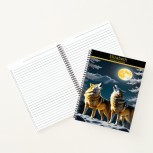Wölfe heulen unter einem leuchtenden Mond Notizbuch
