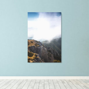 Wolken über Berge rollend Leinwanddruck