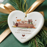 Woodland Foto Baby's First Christmas Keramik Ornament<br><div class="desc">Der erste Weihnachtsschmuck dieses niedlichen Babys beherbergt Waldtiere wie Fuchs, Hasen, Eule und Bär. Das Ornament kann leicht mit dem Namen, dem Datum und dem Foto des Babys personalisiert werden. Das Design ist einfach und skurril, die Waldtiere sind um einen Baumstamm angeordnet. Das Ornament ist perfekt, um das erste Weihnachtsfest...</div>