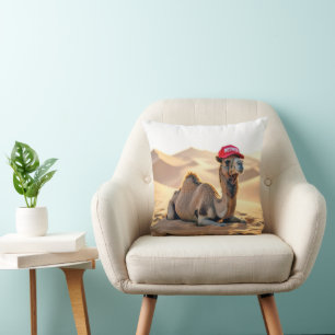 Wüstenkamel mit roter Ruheständlerkappe Kissen