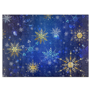XMAS Blue Background mit goldenen Schneeflocken Schneidebrett