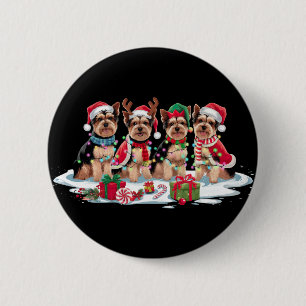 Yorkie-Weihnachtsmannmütze gegen die Weihnachtsbel Button