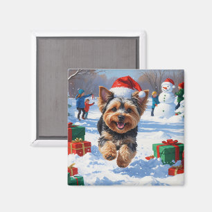 Yorkipoo läuft im Schnee mit Weihnachtsmütze Magnet