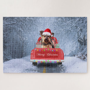 Yorkshire Terrier Hund im Schnee sitzt an Weihnach Puzzle