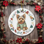 Yorkshire Terrier im Winter Sweater Christmas Keramik Ornament<br><div class="desc">Dieses niedliche Holiday-Ornament besticht durch ein Aquarellbild eines bezaubernden Yorkshire Terrier Hundes, der in seinem Winterpulli gekleidet ist. Das Bild ist in einem farbenfrohen Kreiskranz gerahmt, der aus verschiedenen Holiday-Bildern besteht, darunter ein Schneemann, Glocken, Bonbons, Strumpf, Heilige und vieles mehr! Die Rückseite des Ornaments hat das gleiche Kranzbild mit Ihrem...</div>