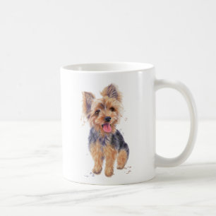 Yorkshire-Terrierhund auf einem Becher Kaffeetasse