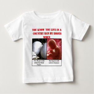 YOU KNOW YOU LIVE IN A COUNTRY RAN BY IDIOTS WHEN BABY T-SHIRT