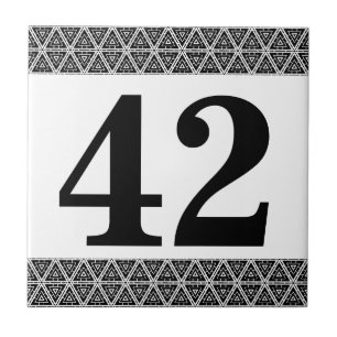 Zahlenteile geometrischer Rahmen schwarz-weiß Fliese