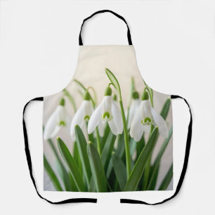 Zarte weiße Schneeglöckchen-Blüten Frühlingsblüte Schürze