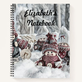 Zeichn von Gnomen in einem Winterlandschaftsheft Notizbuch