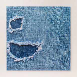 Zerrissene Denim-Stofftextur, blaue Farbtöne. Puzzle