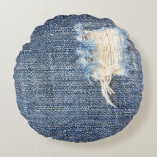 Zerrissene Jeans sehen rund Kissen