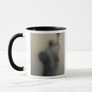 Zerstreutes Bild des Freiheitsstatuen Tasse