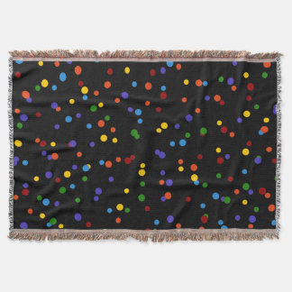 Zerstreutes Regenbogen-Punkte-Muster auf schwarzem Decke