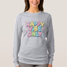 Ziegelstein mit farbenfrohem Text, der „Happy Vibe