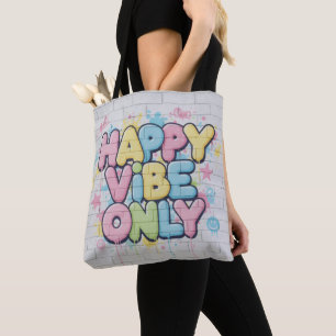 Ziegelstein mit farbenfrohem Text 'Happy Vibe Only