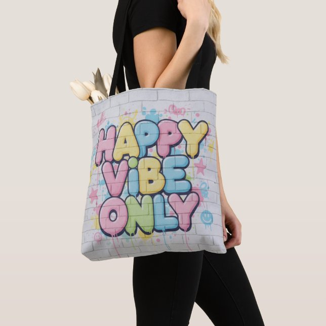 Ziegelstein mit farbenfrohem Text 'Happy Vibe Only (Von Nahem)
