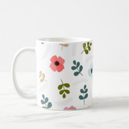 Ziemlich verschiedene farbige Blumen und grünes La Kaffeetasse