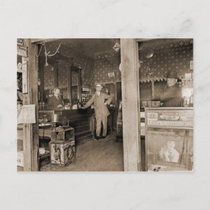 Zigarrenladen-Inneres, circa 1900 Postkarte