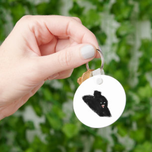 Zischende schwarze Katze zeigt Fangzähne Bleistift Schlüsselanhänger