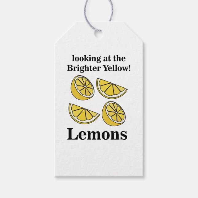 Zitronenfrucht mit Blick auf die hellgelben Zitron Geschenkanhänger (Vorderseite)