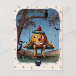 Zu Halloween-Abend auf einer Schaukel gesäumter Kü Postkarte