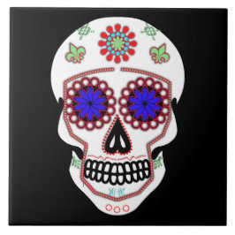 Zuckerschädel mit blauen Augen und grüner Lilie Fliese