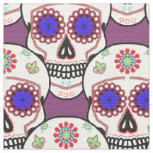 Zuckerschädel mit blauen Augen und grüner Lilie