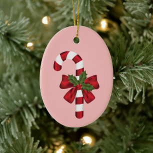 Zuckerstange mit Schleife und Weihnachtsholly auf  Keramik Ornament