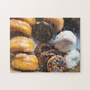 Zusammengesetzte Donuts in einer Schachtel Puzzle