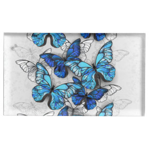 Zusammensetzung der weißen und blauen Schmetterlin Platzkartenhalter