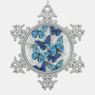 Zusammensetzung der weißen und blauen Schmetterlin Schneeflocken Zinn-Ornament