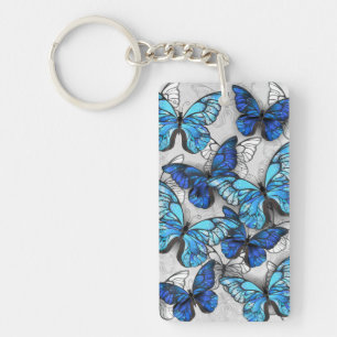 Zusammensetzung von White und Blue Butterflies Schlüsselanhänger