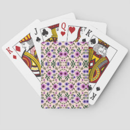 Zwei Bilder zeigen Spielkarten mit floralem Design